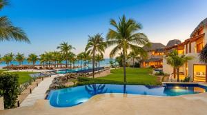 an image of a resort with a swimming pool at Residences at Las Palmas in Zihuatanejo
