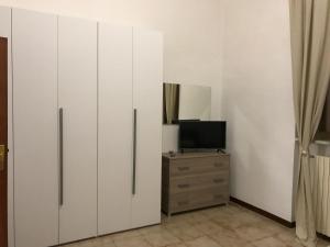 TV a/nebo společenská místnost v ubytování Casa Vacanze Mamarose