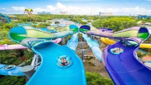 a group of water slides at a water park at SpaceX R4 Shared in Orlando