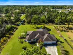 an aerial view of a house with a large yard at SpaceX R4 Shared in Orlando