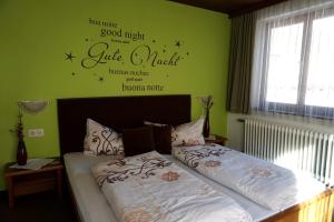 Postel nebo postele na pokoji v ubytování Apart Landhaus Zangerl