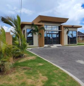 a house with a lot of windows at House of Harmony in Portmore
