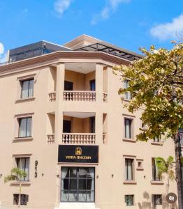 a building with a sign that reads room museum at Hotel Vistta Iracema in Fortaleza