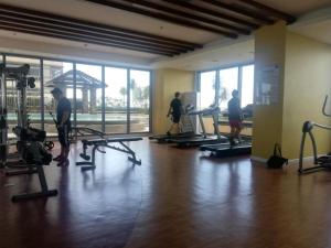 a group of people working out in a gym at Grand Riviera neas Slec in Manila