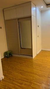an empty room with a large sliding glass door at 2 bed apartment in Buural