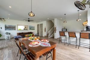 a kitchen and living room with a table and chairs at Villas Shiva, Cahaya & Bulan Complex - Bingin, Uluwatu in Uluwatu
