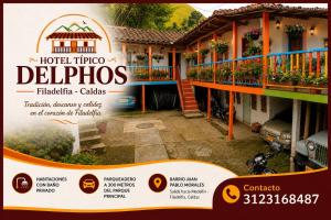 a sign in front of a house with a courtyard at Hotel Típico Delphos in Filadelfia