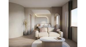 a living room with a couch and a table at Eurana Boutique Hotel in Chiang Mai
