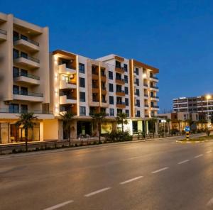 an empty street in front of a building at Lux residence Adrijana 1 in Ulcinj