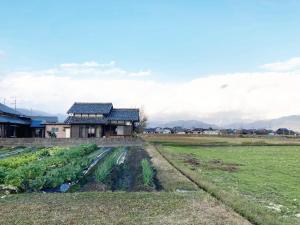 a farm with a house and a field at sikari Vacation STAY 95401v in Takashima