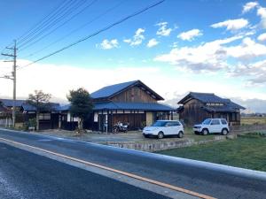 two cars parked on the side of a road at sikari Vacation STAY 95401v in Takashima +35 photos