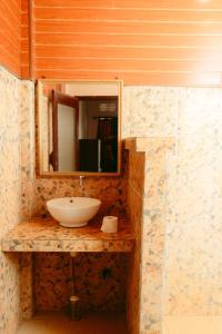 a bathroom with a sink and a mirror at Banana Leaf Bungalow in Gili Trawangan +59 photos