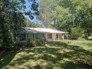 a house with a large yard in front of it at King Bed on Mid North Coast 8 mins A1 in Valery