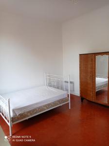 a bedroom with two bunk beds and a mirror at GautierNice in Nice
