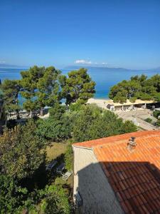 an overhead view of a house with an orange roof at Garden House Tučepi in Tučepi