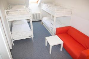 Postel nebo postele na pokoji v ubytování Hostel Franz Kafka