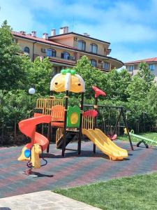 a playground with different types of play equipment at Студио Стайл - Соренто Соле Маре in Sveti Vlas