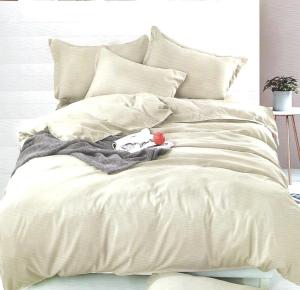 a white bed with a stuffed animal on top of it at Soshanguve Lux Accom Room 03 in Soshanguve