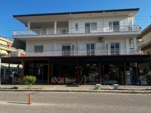 a building on the side of a street at Eleni Studio in Paralia Katerinis