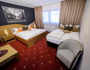 Postel nebo postele na pokoji v ubytování Gasthof Ambachhof