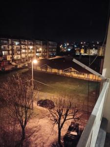 a view of a soccer field at night at njegoševa in Derventa