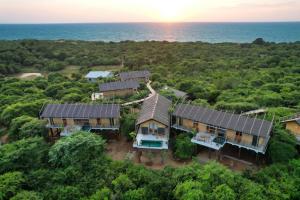 an aerial view of a house with solar panels at O2 Villas Yala in Yala