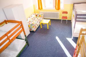 Postel nebo postele na pokoji v ubytování Hostel Franz Kafka