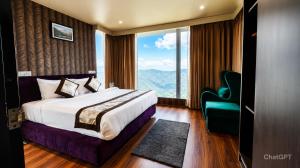 a hotel room with a bed and a large window at Sky Villa Ramgarh Mukteshwar in Mukteshwar