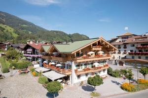 an aerial view of a hotel in a town at Das Krumerhaus in Aschau