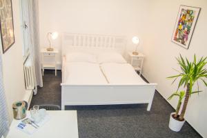 Postel nebo postele na pokoji v ubytování Hostel Franz Kafka