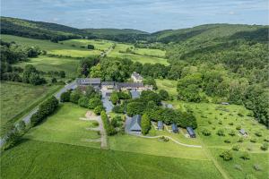an aerial view of a house in the middle of a field at Gîte de la Cour in Campandré-Valcongrain
