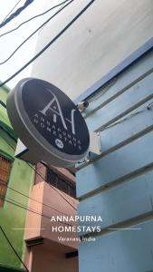 aania sign on the side of a building at Annapurna Homestays in Varanasi