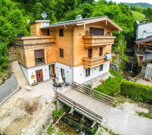 an aerial view of a house with a balcony at Alpenchalet Wasserfallblick in Ramsau