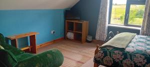 a room with a bed and a table and a chair at Lakeview in Fenagh