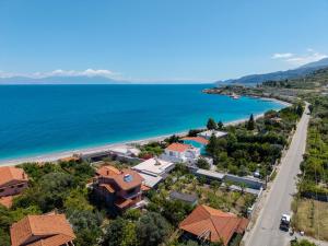 an aerial view of a house and the beach at Villa Dorianna in Egira