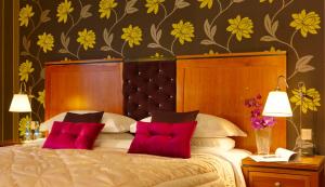 Ένα ή περισσότερα κρεβάτια σε δωμάτιο στο Brook Lane Hotel