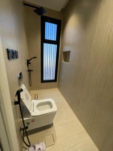 a bathroom with a sink and a window at شقة O&Me الفندقية in Medina +5 photos