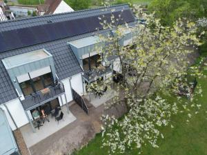 an overhead view of a house with a roof at Haus Bahnhofsblick in Ottersberg