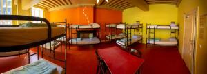 a room with a bunch of bunk beds in it at Strowis Hostel in Utrecht