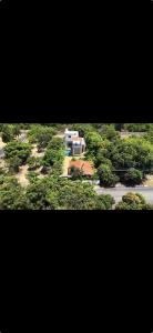 a view of a house in the middle of trees at La reve ecr , Panaiyur in Chennai