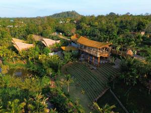 an overhead view of a building with a roof at Tre Vibe Resort Daklak in Buôn Jung