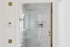a bathroom with a shower with a glass door at 20 Applegrove in Monifieth