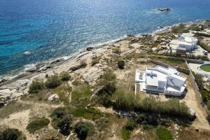 an aerial view of a house on an island near the ocean at Acron Vigla in Mikri Vigla