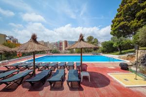 Piscina a Hotel Jardín o a prop