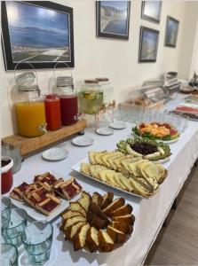 a buffet with many different types of food and drinks at AL Hotel in Vlorë