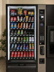 a soda vending machine with soda cans and soft drinks at An der Stadthalle in Braunschweig