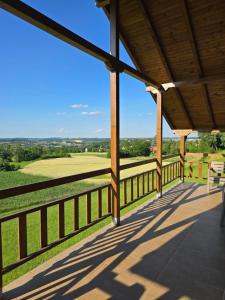 a view from the porch of a house with a view at LIPA houses & spa in Sopot