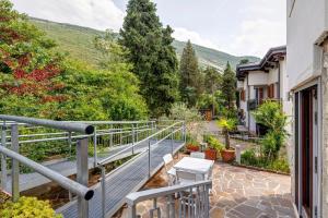 a balcony with a view of the mountains at Villa Ulrica in Nago-Torbole