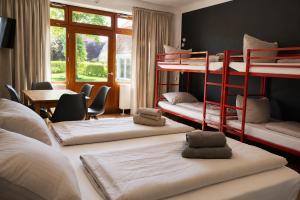 Katil atau katil-katil dalam bilik di Ording Beach Hotel