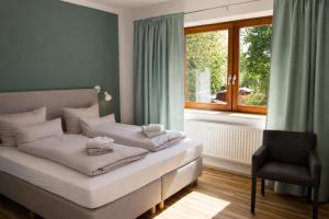 Katil atau katil-katil dalam bilik di Ording Beach Hotel +20 gambar